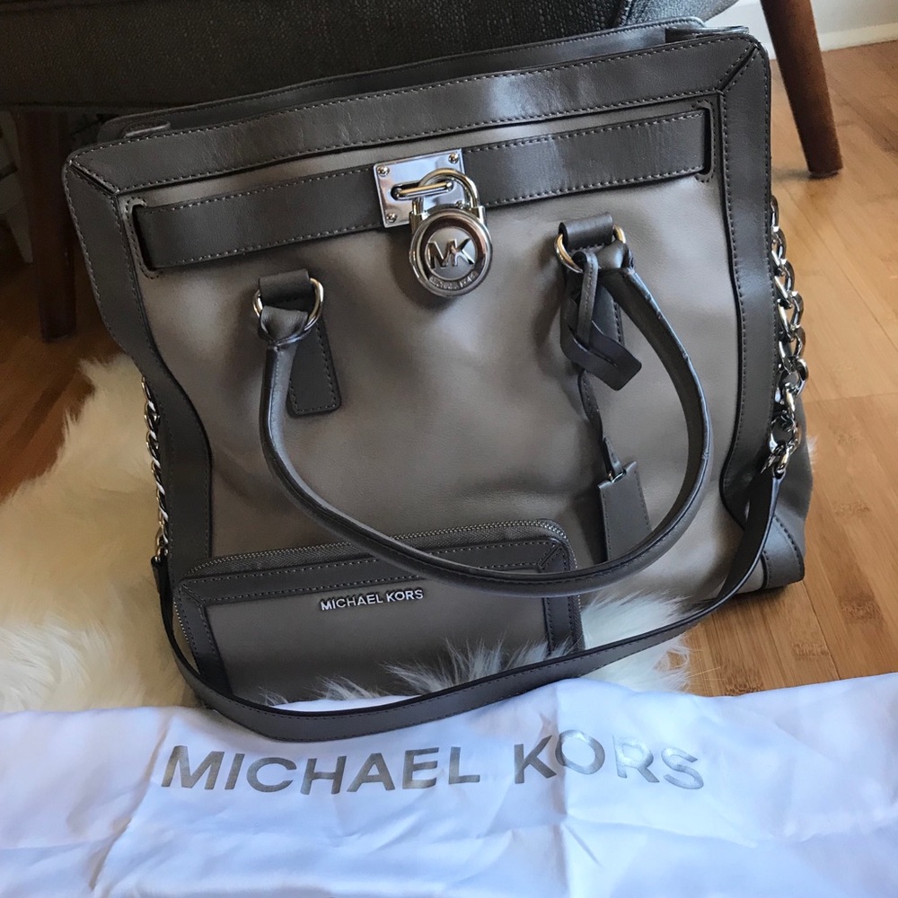 Authentic Michael Kors bag with matching wallet!